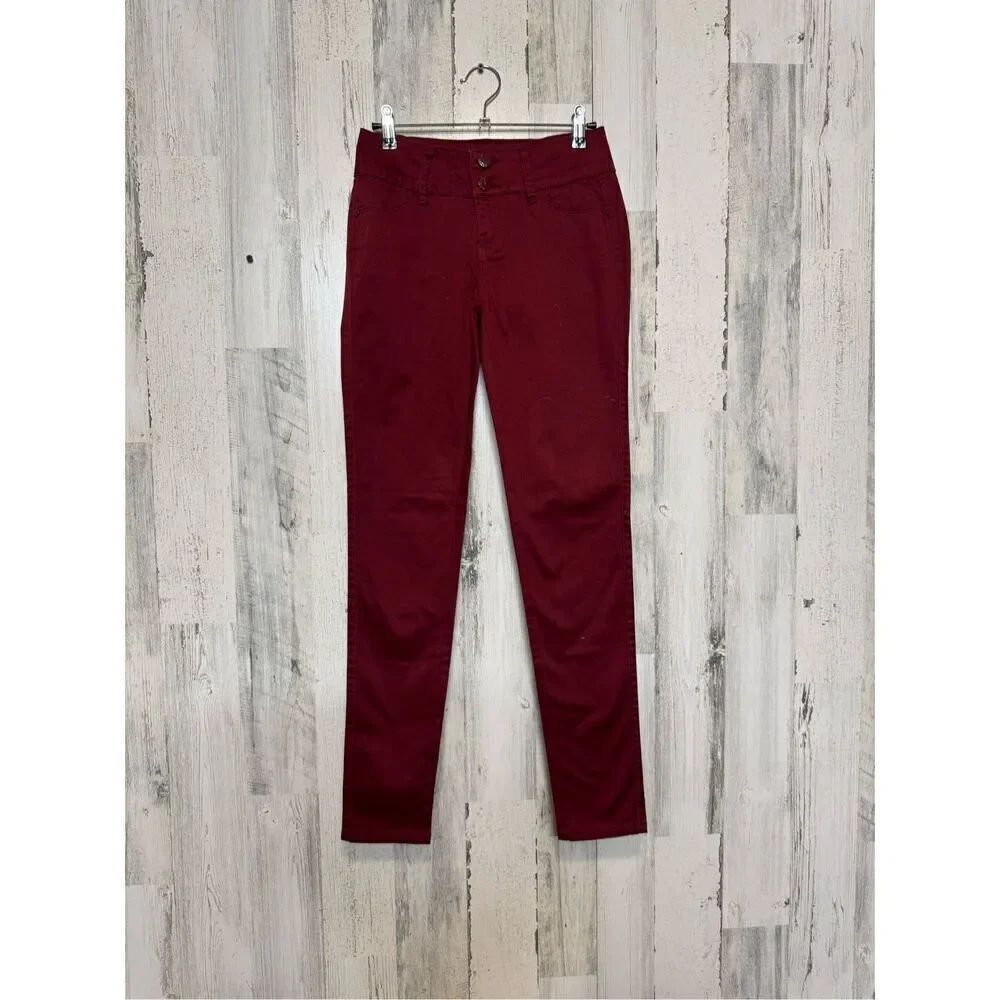 Burgundy skinny jeans